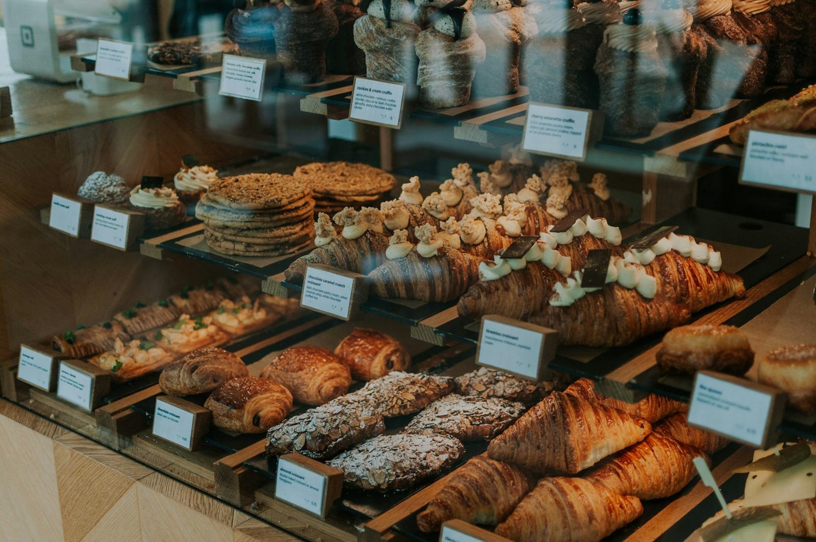 Pastry display case full of baked goods